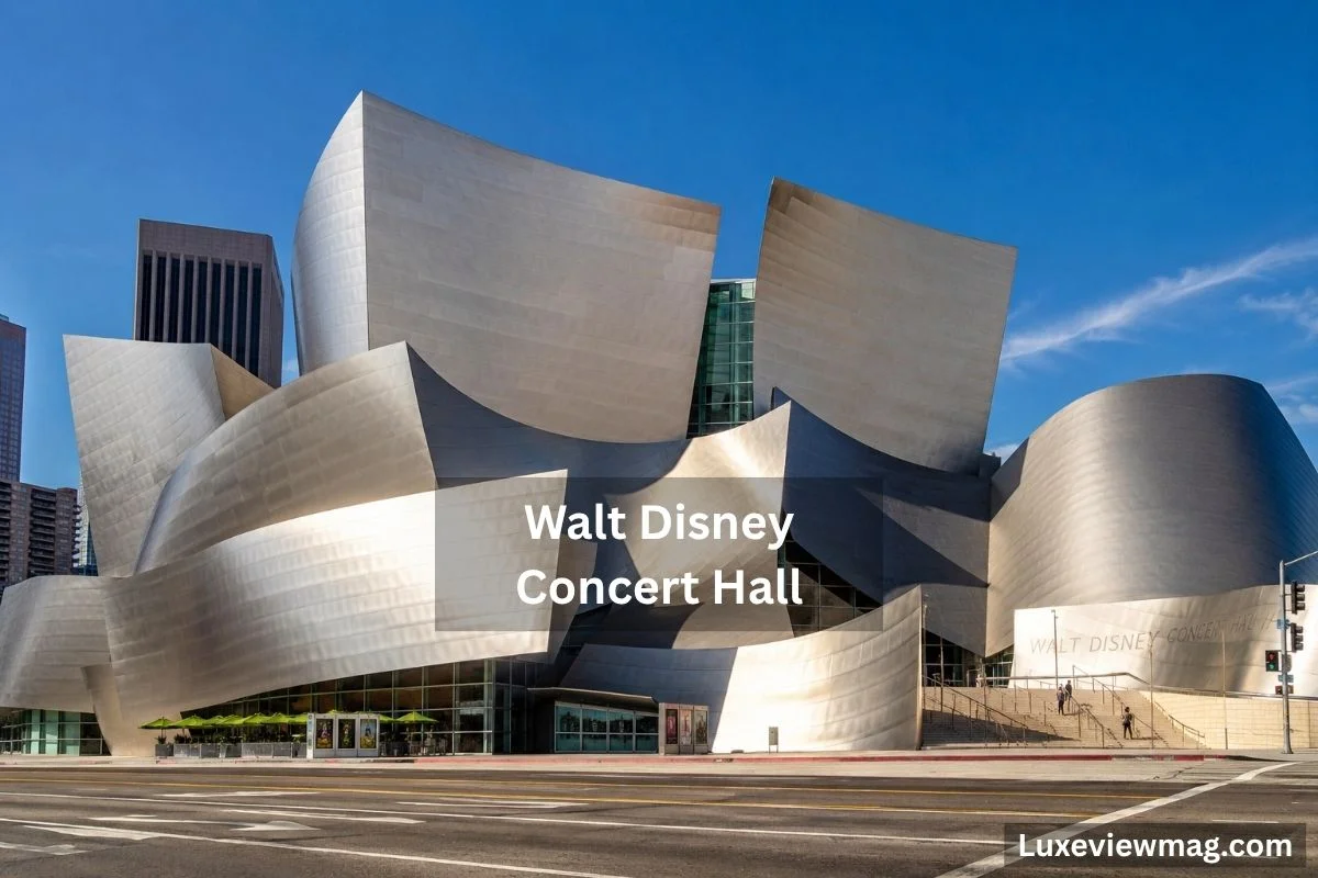 Exterior view of the Walt Disney Concert Hall, showcasing its distinctive stainless steel curves and modern architectural design.