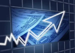 A stock photo showing a graph with a rising trend for the US dollar, highlighting investment potential at 5StarsStocks.com Passive Stocks