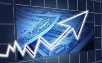 A stock photo showing a graph with a rising trend for the US dollar, highlighting investment potential at 5StarsStocks.com Passive Stocks