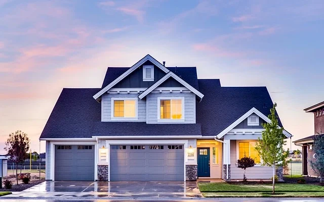 https// mobilehomeexteriors.com with a garage and driveway, emphasizing a neat and organized exterior in a suburban setting.