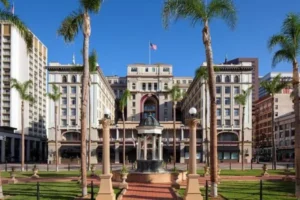 view of downtown San Diego's City Hall, adjacent to the us grant a luxury collection hotel san diego Hotel, showcasing historic architecture.