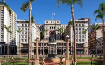 view of downtown San Diego's City Hall, adjacent to the us grant a luxury collection hotel san diego Hotel, showcasing historic architecture.