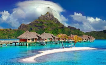 A stunning view of Bora Bora, showcasing its turquoise waters and lush landscapes near the baoase luxury resort​.