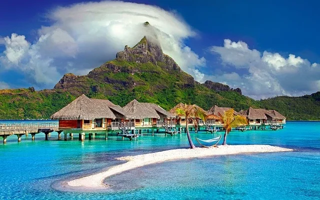 A stunning view of Bora Bora, showcasing its turquoise waters and lush landscapes near the baoase luxury resort​.