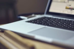 A laptop computer positioned on a desk, showcasing a professional workspace ideal for web&store activities.