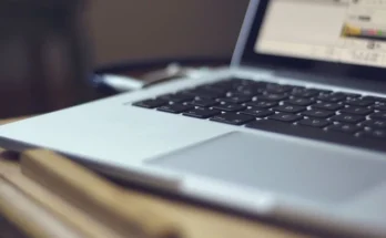 A laptop computer positioned on a desk, showcasing a professional workspace ideal for web&store activities.