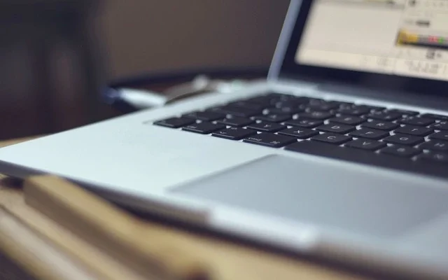 A laptop computer positioned on a desk, showcasing a professional workspace ideal for web&store activities.