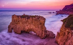 Sunset over the ocean at Jimson Point, Malibu, showcasing vibrant colors at El Matador State Beach.