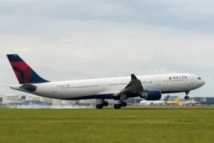A Delta airplane taking off from the runway, part of delta flight DL275 diverted LAX.