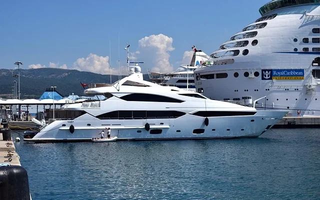 A large white yacht docked in the water, showcasing luxury mega yacht toronto rental​.