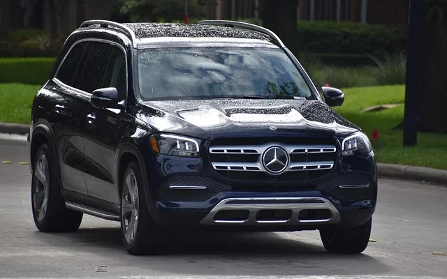 A Mercedes GLS luxury SUV navigating a street, highlighting its elegant style and performance as a best luxury small suv​.